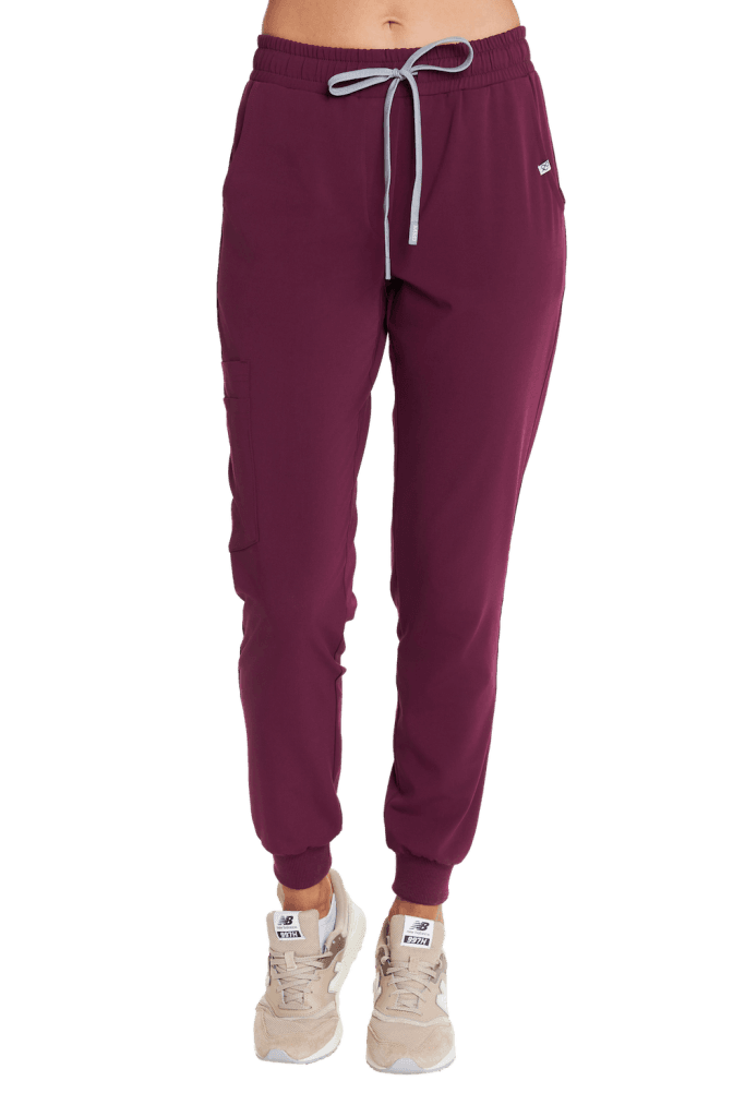 Damskie spodnie medyczne w kolorze bordowym z elastycznym pasem i kieszeniami.