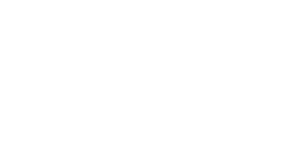 Lekarz w białym fartuchu i stetoskopie trzymający tablet podczas konsultacji medycznej.