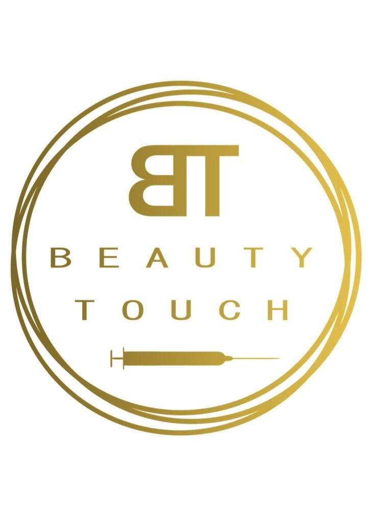 Złote logo Beauty Touch z motywem strzykawki w okręgu
